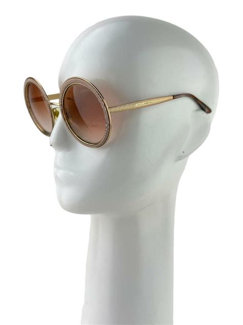 oculos dolce gabbana dourado